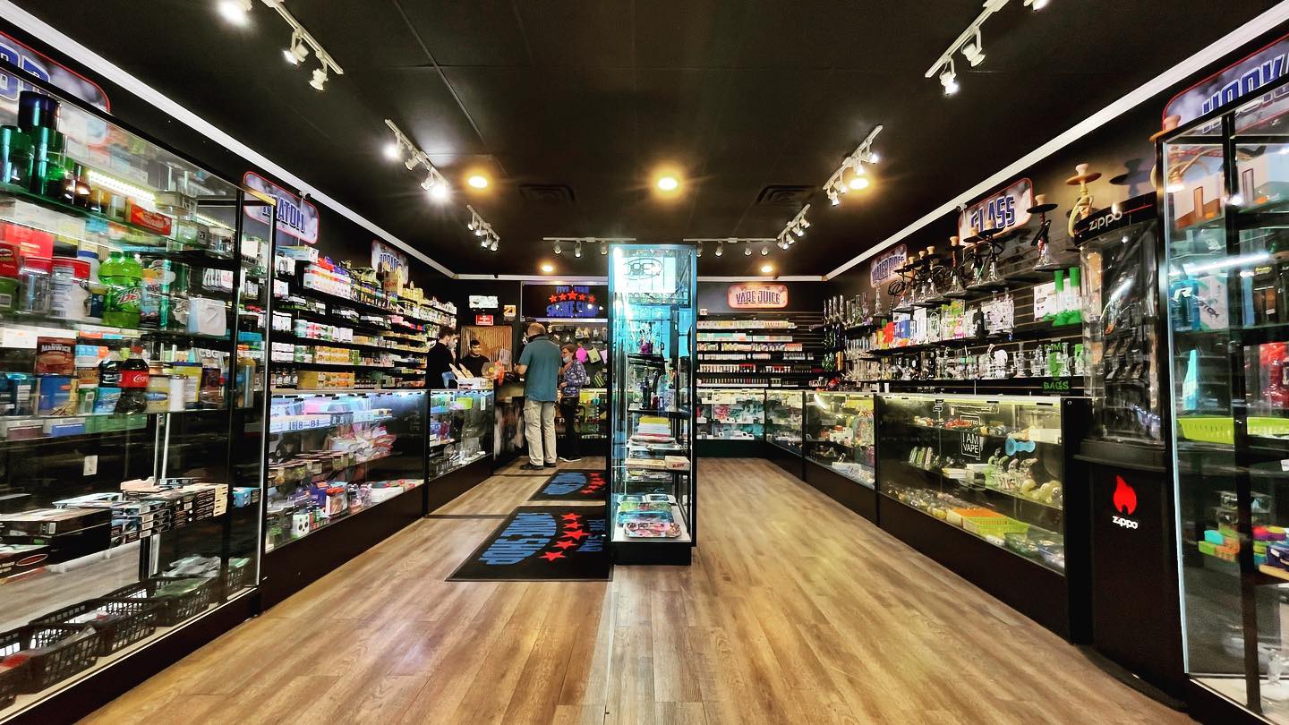 Find Local SmokeShops with Smokeshops + hero image of a smokeshop entryway - brought to you by SmokeShops Plus How do I find local SmokeShops near me?